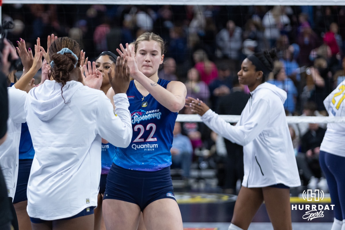 Omaha Supernovas Lindsay Krause (22) gives high five to her teammates after the loss to San Diego Mojo during a professional volleyball match, Sunday, January 19, 2025, in Omaha, Nebraska. Photo by John S. Peterson.