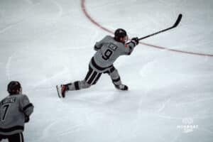 UNO Mavericks player, Brady Risk, makes a pass during a college hockey game on Jan 11th, 2025 in Omaha, Nebraska. Photo by Logan Hock