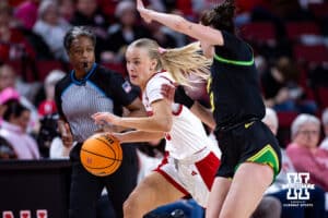 Nebraska Cornhusker guard Alberte Rimdal (5) dribbles the ball against Oregon Duck guard Elisa Mevius (8) in the first quarter during a college women’s basketball game Wednesday, February 19, 2025 in Lincoln, Nebraska. Photo by John S. Peterson.