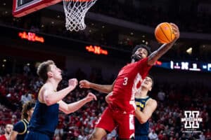 Nebraska Cornhusker guard Brice Williams (3) make a rebound against the Michigan Wolverines in the first half during a college men’s basketball game Monday, February 24, 2025 in Lincoln, Nebraska. Photo by John S. Peterson.