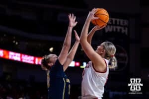 Nebraska Cornhuskers forward Jessica Petrie (12) makes a jumpshot against Michigan Wolverines guard Jordan Hobbs (10) in the first quarter during a college women’s basketball game on Wednesday, February 6, 2025, in Lincoln, Nebraska. Photo by John S. Peterson.