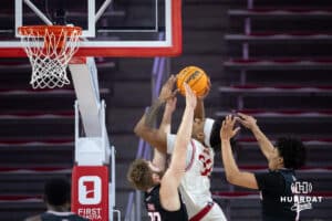 South Dakota Coyotes forward Ashton Smith (32) drives to the basket against Omaha Mavericks forward Joshua Streit (23) in the first half during a college basketball game, Wednesday, January 29, 2025, in Vermillion, South Dakota. Photo by John S. Peterson.