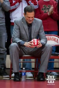 November 24, 2012: John Cook the head coach of the Nebraska Cornhuskers reads a note written by his daugther and player Lauren Cook in the last regular season match for her at the NU Coliseum in Lincoln, Nebraska. Nebraska defeated Northwestern 3 sets to 1. Photo by John S. Peterson.