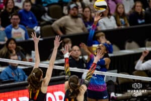 Omaha Supernovas Kelsie Payne (11) spikes the ball against Columbus Fury Megan Courtney-Lush (17) and Abby Walker (24) during a professional volleyball match, Friday, January 31, 2025, in Omaha, Nebraska. Photo by John S. Peterson