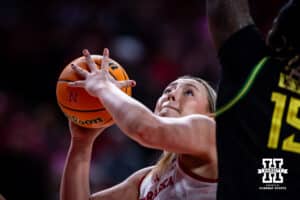 Nebraska Cornhusker center Alexis Markowski (40) puts up a layup against Oregon Duck center Phillipina Kyei (15) in the second quarter during a college women’s basketball game Wednesday, February 19, 2025 in Lincoln, Nebraska. Photo by John S. Peterson.