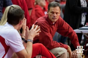 November 30, 2012: John Cook the head coach of the Nebraska Cornhuskers talking to his other coaches Dan Meske and Dani Bushoom-Kelly. Nebraska swept UNI in the second round of the NCAA Women's Volleyball Championships at the NU Coliseum in Lincoln, Nebraska. Photo by John S. Peterson.