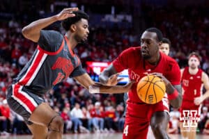 Nebraska Cornhusker forward Juwan Gary (4) dribbles the ball against Ohio State Buckeye forward Sean Stewart (13) in the first half during a college men’s basketball game on Sunday, February 9, 2025, in Lincoln, Nebraska. Photo by John S. Peterson.