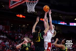 Nebraska Cornhusker forward Petra Bozan (44) makes the put back layup against Oregon Duck forward Sarah Rambus (23) in the second quarter during a college women’s basketball game Wednesday, February 19, 2025 in Lincoln, Nebraska. Photo by John S. Peterson.