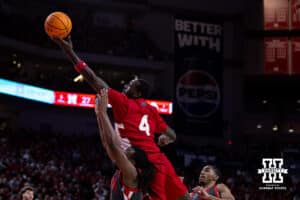 Nebraska Cornhusker forward Juwan Gary (4) reaches for the rebound over Ohio State Buckeye guard Bruce Thornton (2) in the first half during a college men’s basketball game on Sunday, February 9, 2025, in Lincoln, Nebraska. Photo by John S. Peterson.