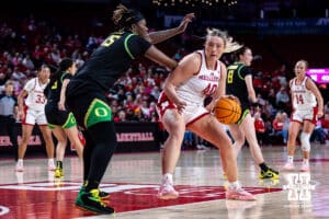 Nebraska Cornhusker center Alexis Markowski (40) dribbles the ball against Oregon Duck center Phillipina Kyei (15) in the second quarter during a college women’s basketball game Wednesday, February 19, 2025 in Lincoln, Nebraska. Photo by John S. Peterson.