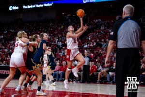 Nebraska Cornhuskers forward Jessica Petrie (12) makes a layup against the Michigan Wolverines in the third quarter during a college women’s basketball game on Wednesday, February 6, 2025 in Lincoln, Nebraska. Photo by John S. Peterson.