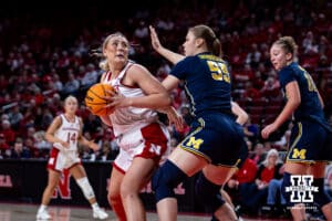 Nebraska Cornhuskers center Alexis Markowski (40) spins for a layup against Michigan Wolverines center Yulia Grabovskaia (55) in the third quarter during a college women’s basketball game on Wednesday, February 6, 2025 in Lincoln, Nebraska. Photo by John S. Peterson.