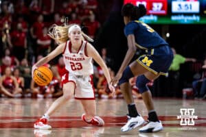 Nebraska Cornhuskers guard Britt Prince (23) dribbles the ball against Michigan Wolverines guard Te'Yala Delfosse (33) in the third quarter during a college women’s basketball game on Wednesday, February 6, 2025 in Lincoln, Nebraska. Photo by John S. Peterson.