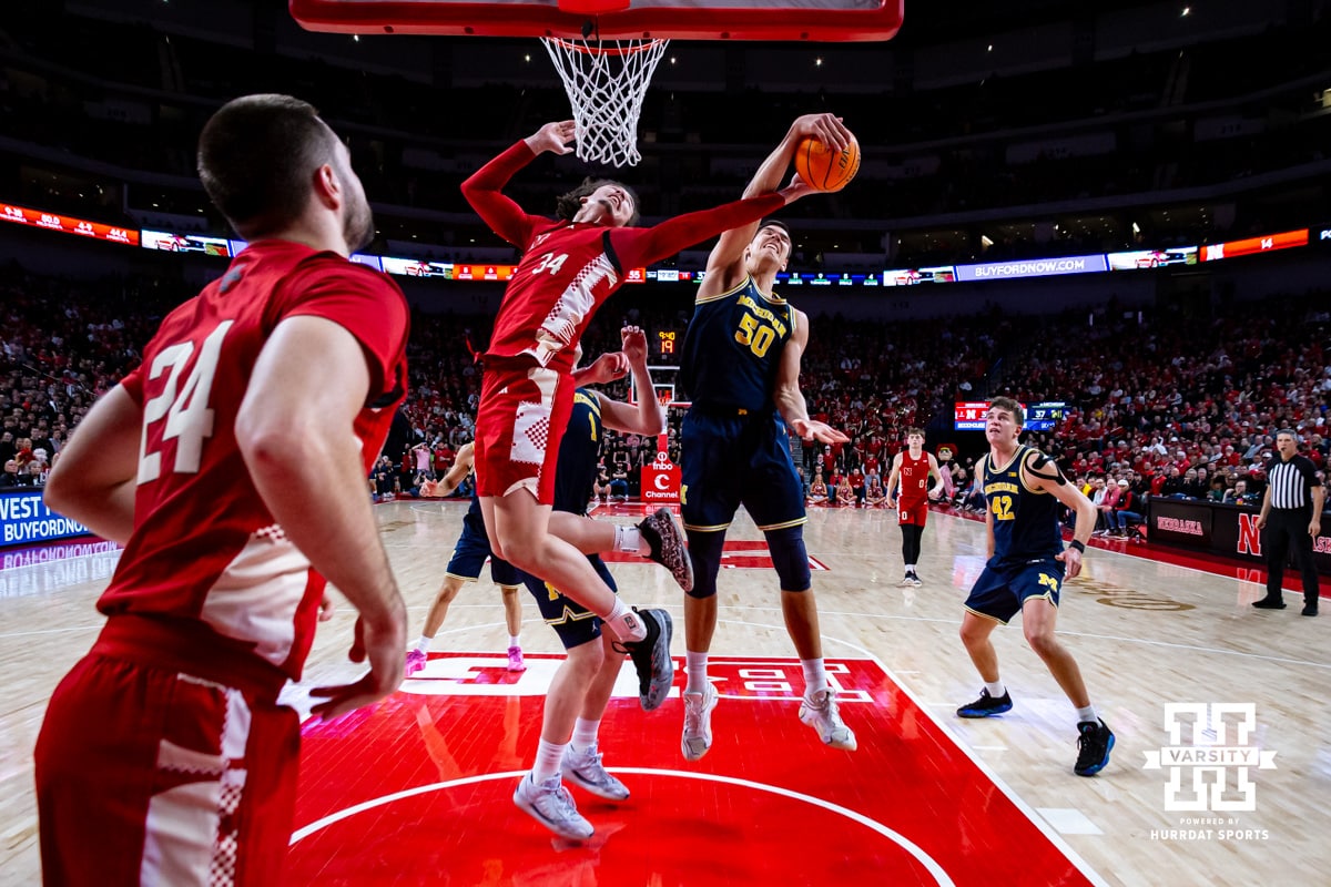 Nebraska Cornhusker center Braxton Meah (34) and Michigan Wolverine center Vladislav Goldin (50) go after a rebound in the second half during a college men’s basketball game Monday, February 24, 2025 in Lincoln, Nebraska. Photo by John S. Peterson.