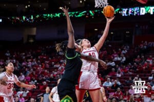 Nebraska Cornhusker center Alexis Markowski (40) makes a layup against Oregon Duck center Phillipina Kyei (15) in the fourth quarter during a college women’s basketball game Wednesday, February 19, 2025 in Lincoln, Nebraska. Photo by John S. Peterson.