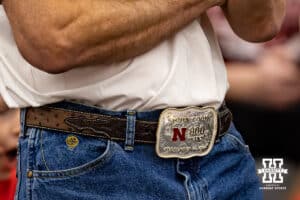 Nebraska Cornhusker head coach John Cook wears his 800 win belt buckle against the Wichita State Shockers during the spring volleyball match Saturday, April 29, 2023, in Central City, Neb. Photo by John S. Peterson.