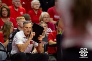 Nebraska Cornhusker head coach John Cook gives a signal for the serve against the USC Trojans during a college volleyball match Sunday, September 29, 2024, in Lincoln, Nebraska. Photo by John S. Peterson.