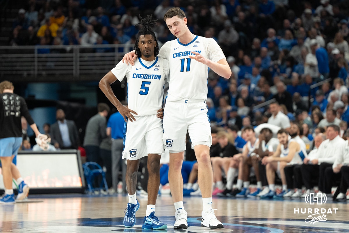 Creighton Bluejays Ryan Kalkbrenner talks with Jamiya Neal during a college basketball game against Marquette on February 8th, 2025 in Omaha, Nebraska. Photo by Brandon Tiedemann.