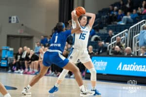 Creighton Bluejays Lauren Jensen looks to pass through a foul during a college basketball game against Seton Hall on February 5th, 2025 in Omaha Nebraska. Photo by Brandon Tiedemann.