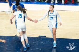 Creighton Bluejays Lauren Jensen and Molly Mogensen high five during a college basketball game against Seton Hall on February 5th, 2025 in Omaha Nebraska. Photo by Brandon Tiedemann.