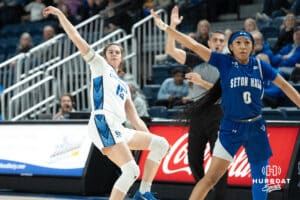 Creighton Bluejaysd Lauren Jensen attempts a heavily contested three during a college basketball game against Seton Hall on February 5th, 2025 in Omaha Nebraska. Photo by Brandon Tiedemann.