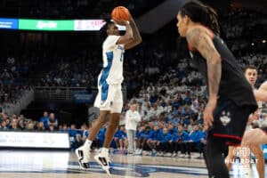 Creighton Bluejays Jamiya Neal shoots a three pointer during a college basketball game against UCONN on February 11th, 2025 in Omaha Nebraska. Photo by Brandon Tiedemann.