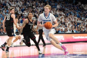 Creighton Bluejays Jackson McAndrew looks to score during a college basketball game against UCONN on February 11th, 2025 in Omaha Nebraska. Photo by Brandon Tiedemann.