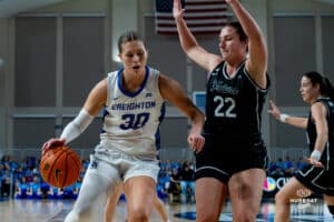 Creighton Bluejay Morgan Maly (30) looking to drive on the basket against Providence Friars Brynn Farrell (22) during a basketball game at Sokol Arena on Sunday, February 02, 2025, in Omaha, Nebraska. Photo by Collin Stilen.