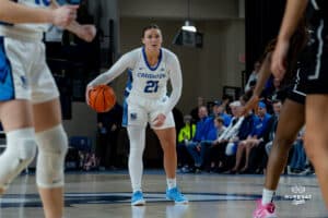 Creighton Bluejay holds the ball as she looks for the next step against the Providence Friars during a basketball game at Sokol Arena on Sunday, February 02, 2025, in Omaha, Nebraska. Photo by Collin Stilen.