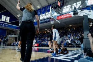 Creighton Bluejay Kiani Lockett celebrating over a late and-one foul for the Bluejay against the Providence Friars during a basketball game at Sokol Arena on Sunday, February 02, 2025, in Omaha, Nebraska. Photo by Collin Stilen.