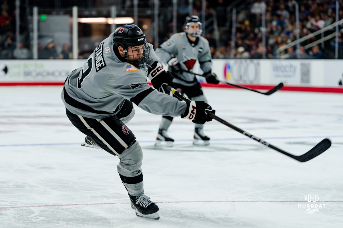 Omaha Maverick Sam Stange takes a shot during a hockey match at Baxter Arena on Saturday, February 2, 2025, in Omaha, Nebraska. Photo by Collin Stilen.