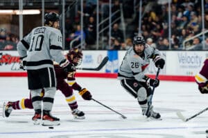 Omaha Maverick Brock Bremer looks to attack the puck during a hockey match at Baxter Arena on Saturday, February 2, 2025, in Omaha, Nebraska. Photo by Collin Stilen.