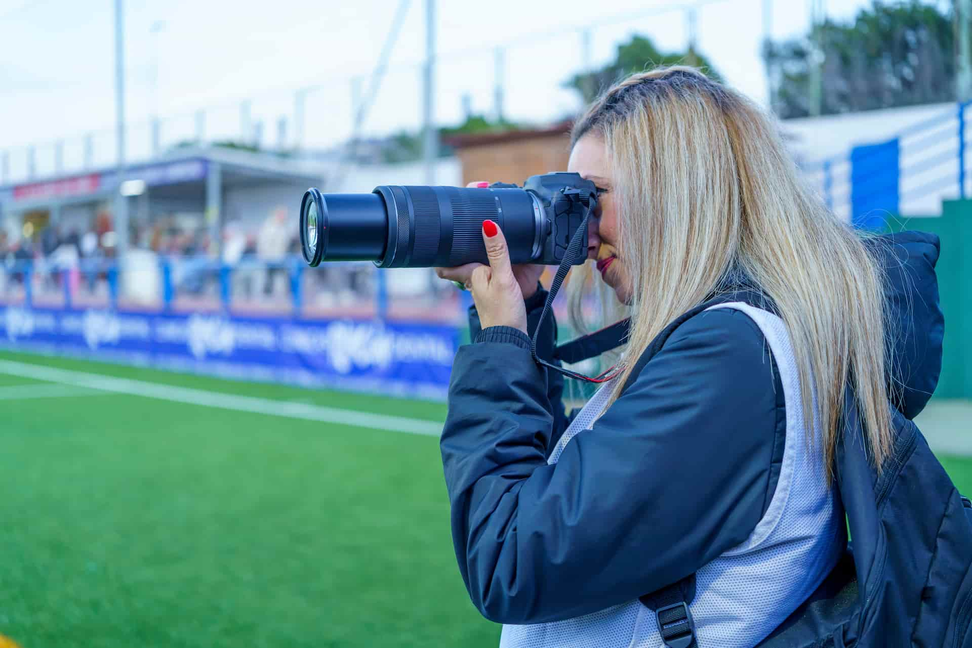 sports photographer on a field