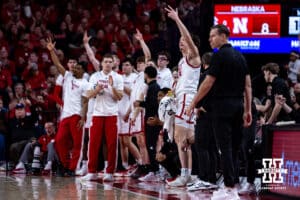 Nebraska Cornhuskers bench celebrates the three-pint shot from Connor Essegian in the first half against the Minnesota Golden Gophers during a men’s college basketball game Saturday, March 1, 2025 in Lincoln, Nebraska. Photo by John S. Peterson.