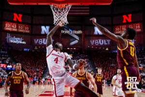 Nebraska Cornhusker forward Juwan Gary (4) makes a lay up against Minnesota Golden Gopher guard Femi Odukale (11) in the first half during a men’s college basketball game Saturday, March 1, 2025 in Lincoln, Nebraska. Photo by John S. Peterson.