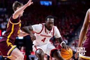 Nebraska Cornhusker forward Juwan Gary (4) drives the lane against Minnesota Golden Gopher guard Brennan Rigsby (24) in the first half during a men’s college basketball game Saturday, March 1, 2025 in Lincoln, Nebraska. Photo by John S. Peterson.