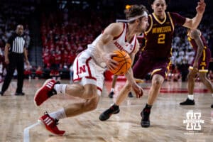 Nebraska Cornhusker guard Sam Hoiberg (1) drives to the basket against Minnesota Golden Gopher guard Mike Mitchell Jr. (2) in the second half during a men’s college basketball game Saturday, March 1, 2025 in Lincoln, Nebraska. Photo by John S. Peterson.