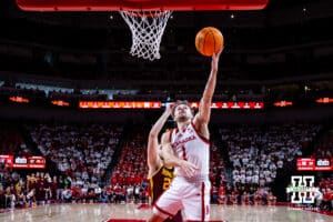 Nebraska Cornhusker guard Sam Hoiberg (1) makes a lay up against the Minnesota Golden Gophers in the second half during a men’s college basketball game Saturday, March 1, 2025 in Lincoln, Nebraska. Photo by John S. Peterson.