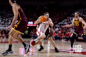 Nebraska Cornhusker guard Sam Hoiberg (1) dirves to the basket against the Minnesota Golden Gophers in the second half during a men’s college basketball game Saturday, March 1, 2025 in Lincoln, Nebraska. Photo by John S. Peterson.