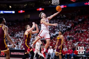 Nebraska Cornhusker guard Sam Hoiberg (1) makes a lay up against the Minnesota Golden Gophers in the second half during a men’s college basketball game Saturday, March 1, 2025 in Lincoln, Nebraska. Photo by John S. Peterson.