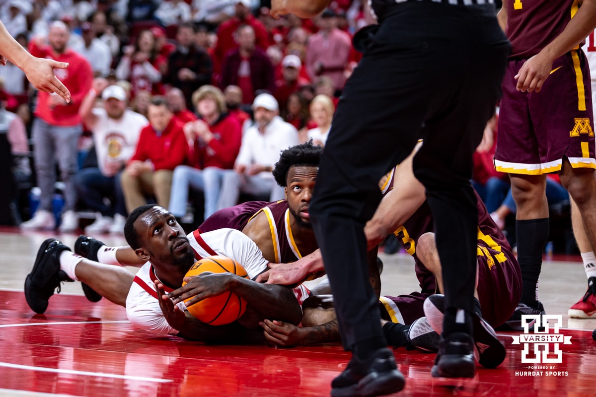 Nebraska Cornhusker forward Juwan Gary (4) dives for the loose ball and calls timeout against the Minnesota Golden Gophers in the second half during a men’s college basketball game Saturday, March 1, 2025 in Lincoln, Nebraska. Photo by John S. Peterson.