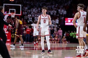 Nebraska Cornhusker guard Connor Essegian (0) gives a fist pump after the Huskers close the gap against the Minnesota Golden Gophers in the second half during a men’s college basketball game Saturday, March 1, 2025 in Lincoln, Nebraska. Photo by John S. Peterson.