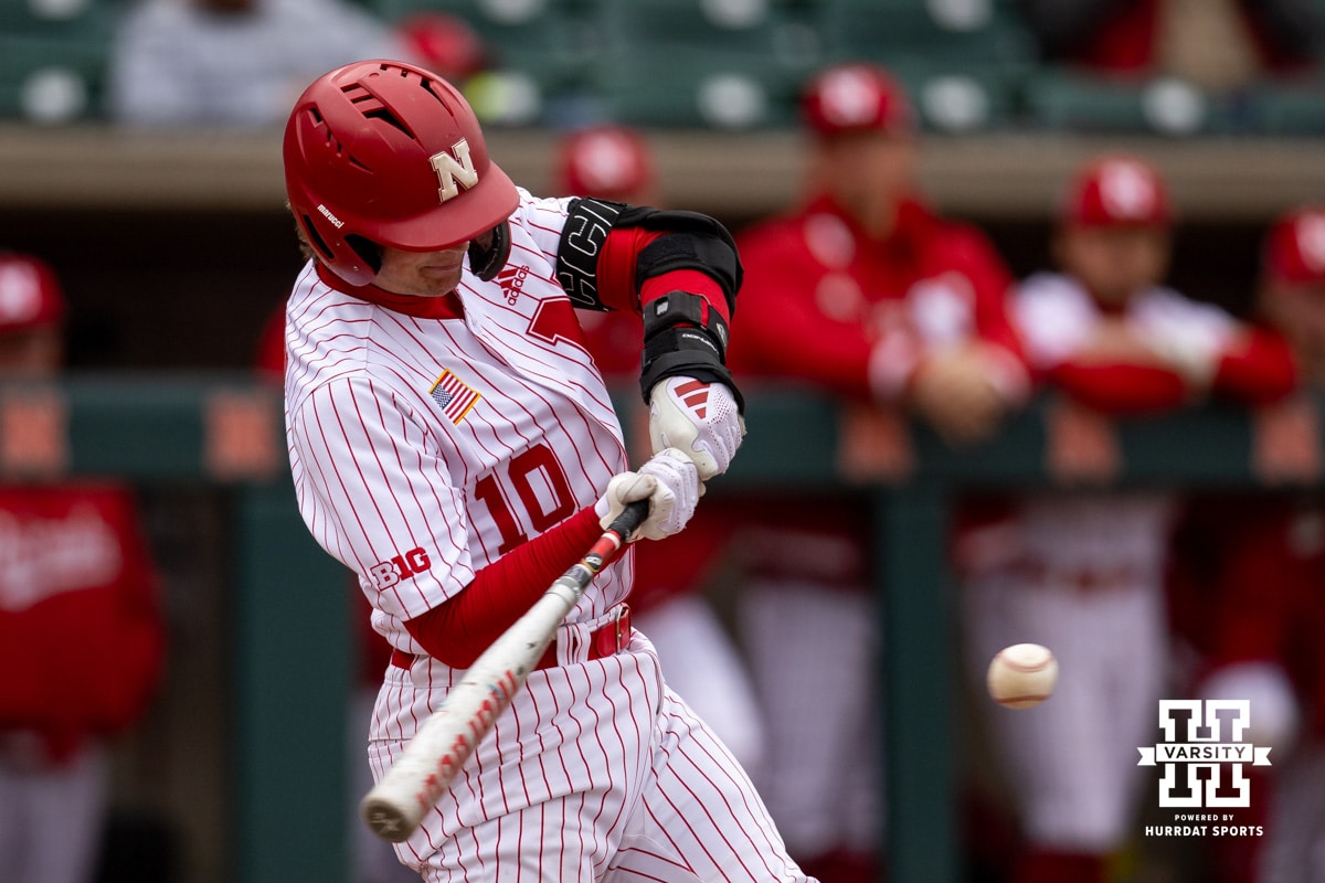 Nebraska Cornhusker catcher Hogan Helligso (10) hits a single bringing in Carey against the Creighton Bluejays in the second during a college baseball game Tuesday, April 1, 2025 in Lincoln, Nebraska. Photo by John S. Peterson.