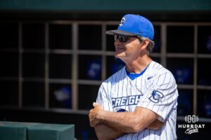 Creighton Bluejays head coach Ed Servais watching warm up before taking on the Xavier Musketeers during a college baseball game on Sunday, May 11, 2025 in Omaha, Nebraska. Photo by John S. Peterson.