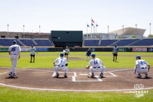 Creighton Bluejays head coach Ed Servais' family members throwing out the first pitch before taking on the Xavier Musketeers during a college baseball game on Sunday, May 11, 2025 in Omaha, Nebraska. Photo by John S. Peterson.
