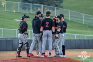 Omaha Mavericks meet on the mound during a baseball game against North Dakota State Wednesday, May 21st, 2025, in Omaha, Nebraska. Photo by Brandon Tiedemann.