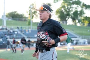 Omaha’s Drew Borner walks into the dugout during a baseball game against North Dakota State Wednesday, May 21st, 2025, in Omaha, Nebraska. Photo by Brandon Tiedemann.