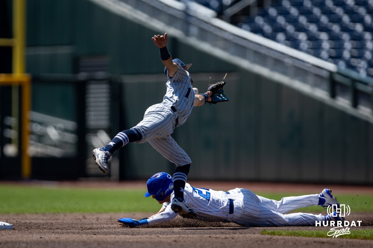Creighton Bluejay outfielder Tate Gillen (20) steals second base against Xavier Musketeer infielder Nolan Tucker (1) in the first inning during a college baseball game on Sunday, May 11, 2025 in Omaha, Nebraska. Photo by John S. Peterson.