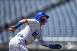 Creighton Bluejay outfielder Tate Gillen (20) scores after a second throwing error against the Xavier Musketeers in the first inning during a college baseball game on Sunday, May 11, 2025 in Omaha, Nebraska. Photo by John S. Peterson.