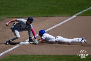 Creighton Bluejay Nolan Sailors (1) slides to third base against Xavier Musketeer infielder Luke Hammond (3) during a college baseball game on Sunday, May 11, 2025 in Omaha, Nebraska. Photo by John S. Peterson.